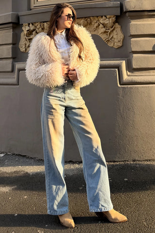 Blugi wide leg albastru deschis cu efect decolorat cald